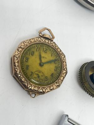 LOT 219J: Various Watch Parts and Pieces
