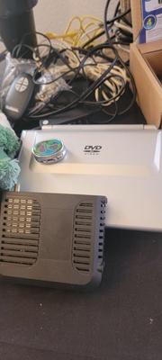 Holmes fan, rug, DVD player