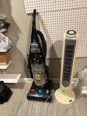 BISSELL BAGLESS VACUUM MODEL 82H1 and 30” HOLMES OSCILLATING TOWER FAN WITH REMOTE