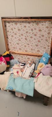 Baby clothes and wood storage container