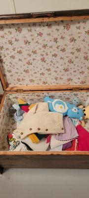Baby clothes and wood storage container