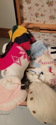 Baby clothes and wood storage container