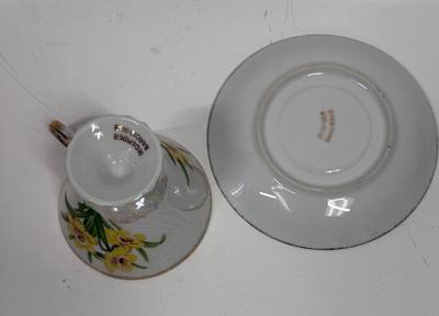 Vintage tea cup, and saucer, marked December nacisis