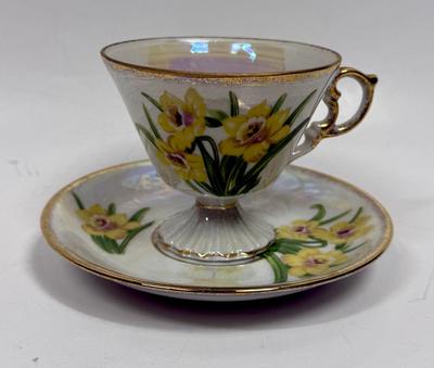 Vintage tea cup, and saucer, marked December nacisis