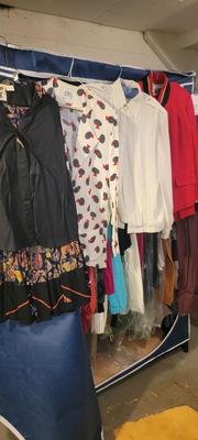 Large portable clothes storage plus clothes