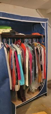 Large portable clothes storage plus clothes