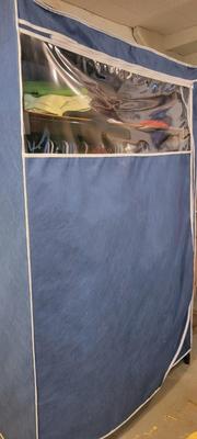 Large portable clothes storage plus clothes