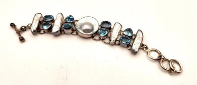 Lot #183 Lovely Charles Albert Sterling Silver, Blue Topaz and Mother of Pearl Bracelet