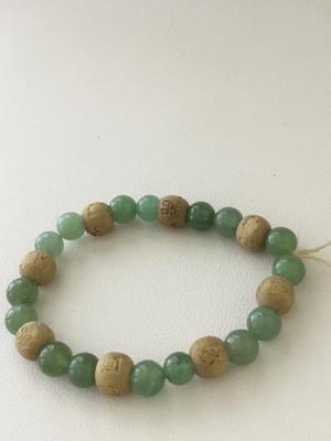 Beautiful green and tan stretchy beaded bracelet