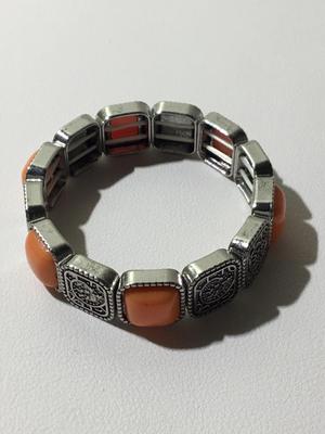 Beautiful silver tone orange stretchy bracelet