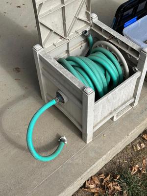 BIRD FEEDER WITH TOTE OF BIRD SEED AND HOSE HIDEAWAY