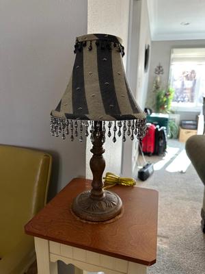 VINTAGE ARM CHAIR WITH CUSHION, NARROW END TABLE AND VINTAGE LAMP