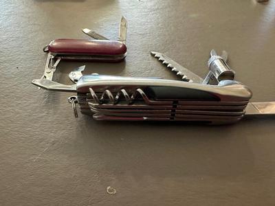LIGHTER, 2 FOLDING MULTI FUNCTION POCKET KNIVES AND SMALL TAPE MEASURE