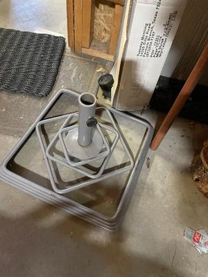 Two umbrellas with umbrella stand