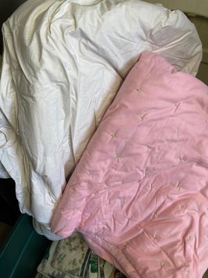 Flannel sheets, down, comforter, blanket in tote