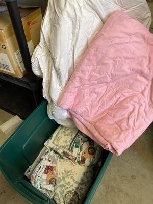 Flannel sheets, down, comforter, blanket in tote