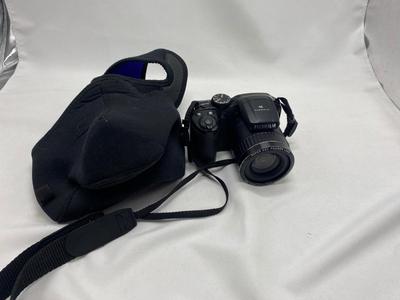 FUJI DIGITAL CAMERA IN A CASE AND A TRIPOD