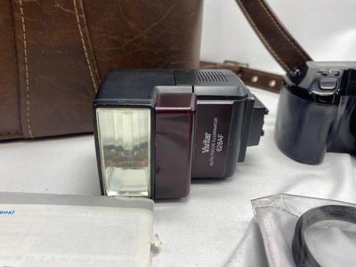 MINOLTA 35mm CAMERA WITH LENS ALSO SPARE BATTERIES FOR. IKON CAMERAS