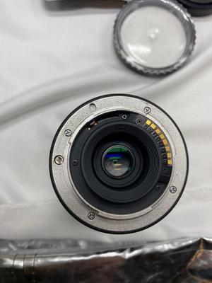 MINOLTA 35mm CAMERA WITH LENS ALSO SPARE BATTERIES FOR. IKON CAMERAS