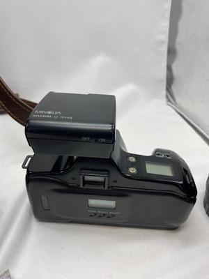 MINOLTA 35mm CAMERA WITH LENS ALSO SPARE BATTERIES FOR. IKON CAMERAS