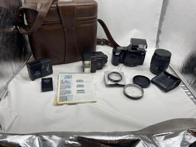 MINOLTA 35mm CAMERA WITH LENS ALSO SPARE BATTERIES FOR. IKON CAMERAS