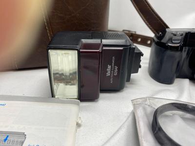 MINOLTA 35mm CAMERA WITH LENS ALSO SPARE BATTERIES FOR. IKON CAMERAS