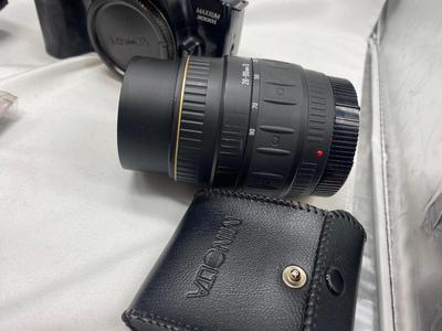MINOLTA 35mm CAMERA WITH LENS ALSO SPARE BATTERIES FOR. IKON CAMERAS