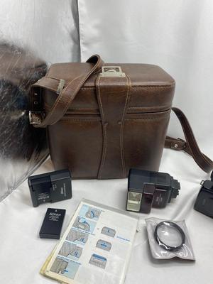 MINOLTA 35mm CAMERA WITH LENS ALSO SPARE BATTERIES FOR. IKON CAMERAS