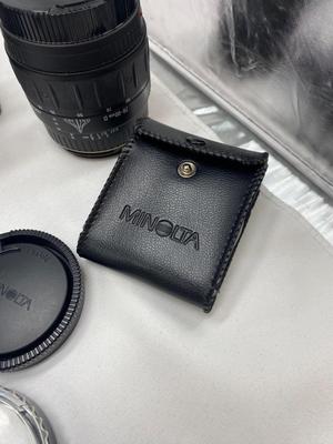 MINOLTA 35mm CAMERA WITH LENS ALSO SPARE BATTERIES FOR. IKON CAMERAS