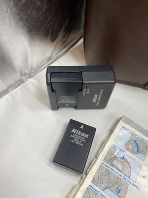 MINOLTA 35mm CAMERA WITH LENS ALSO SPARE BATTERIES FOR. IKON CAMERAS
