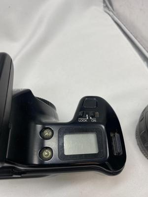 MINOLTA 35mm CAMERA WITH LENS ALSO SPARE BATTERIES FOR. IKON CAMERAS