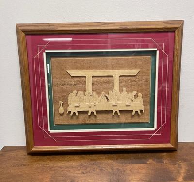 Sale Photo Thumbnail #438: Framed size approx. 22.5" x 19". Similar to a shadow-box, has 4 layers of intricately cut wood creating a 3-D image of the last supper. Framed, matted and behind clear plexiglass.