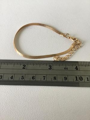 Gold tone chain like bracelet