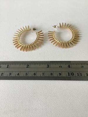 Gold tone spike fashion hoop earrings