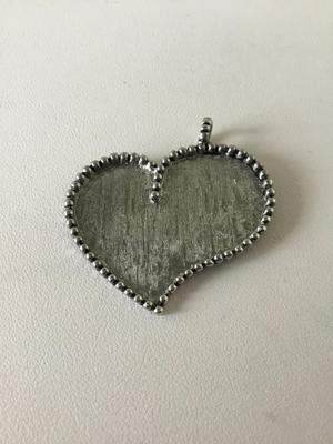 Silver tone heart pendant necklace