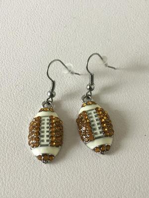 Unmarked rhinestone football earrings