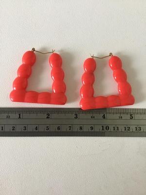Red fashion statement earrings