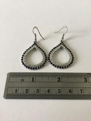 Silver tone fashion dangle earrings