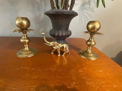 BRASS CANDLESTICK HOLDERS, SILK FLOWERS AND FOLIAGE ARRANGEMENT PLUS AN ELEPHANT