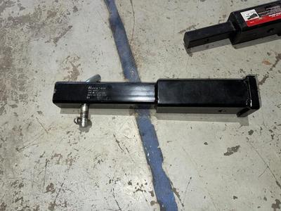 1 1/4" - 2" HITCH ADAPTER, 1 YOKOHAMA 225/65R17 TIRE AND A HITCH