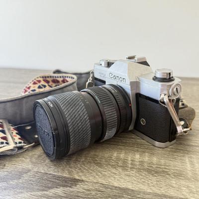 LOT 1K: Vintage Canon TX 35mm Film Camera w/ Lens & Manual