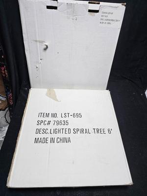 Two outdoor Spiral 6-foot Christmas trees