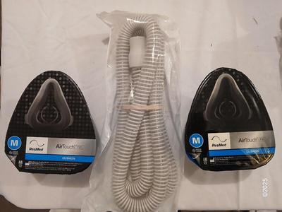 Two Medium AirTouch ResMed F20 cushions with one hose SEALED BRAND NEW