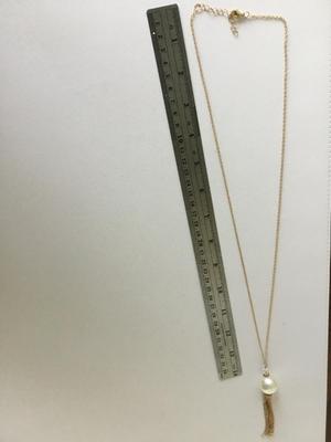 Gold tone faux pearl long necklace