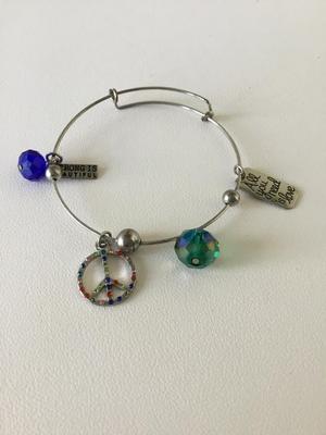 Beautiful peace charm bracelet