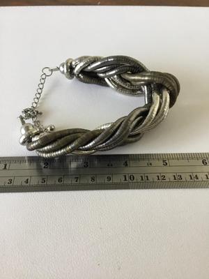 Beautiful twist unmarked statement bracelet