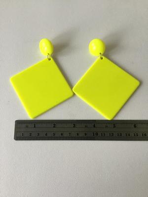 Yellow statement earrings