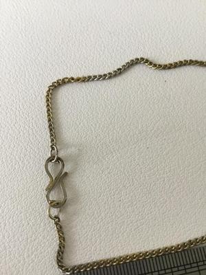Vintage unmarked dollar sign necklace