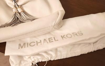 Lot #243 Michael Kors Handbag - like new in storage pouch