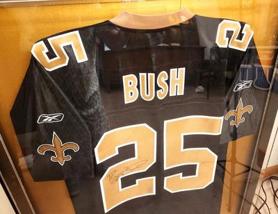 Lot #266 New Orleans Saints Football Reggie Bush Jersey - autographed - Shadow Box Frame - COA